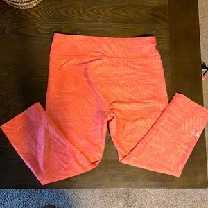 Bright orange under armour leggings